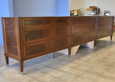Custom Double Sink Base; crotch mahogany w/metal leg cups; 145" x 22" x 35"